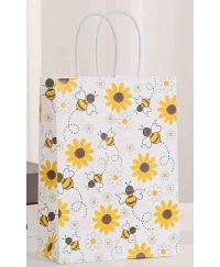 Paper gift bag with bee and flower motifs