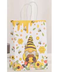 Paper gift bag with bee motifs